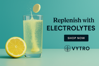 VYTRO electrolytes supplement banner with lemon, hydration drops, and mineral-rich water splashing on a clean pastel background – boosts hydration, energy, and recovery