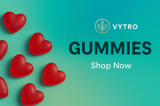 VYTRO branded vitamin gummies displayed in a glass jar with vibrant fruit flavours on a pastel background – promoting fun, chewable supplements for adults and kids